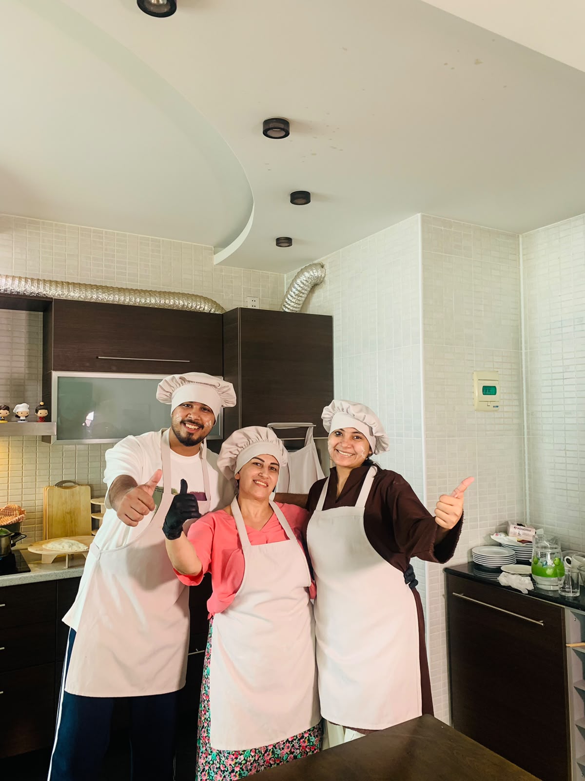 Small group smiling after a Baku cooking class
